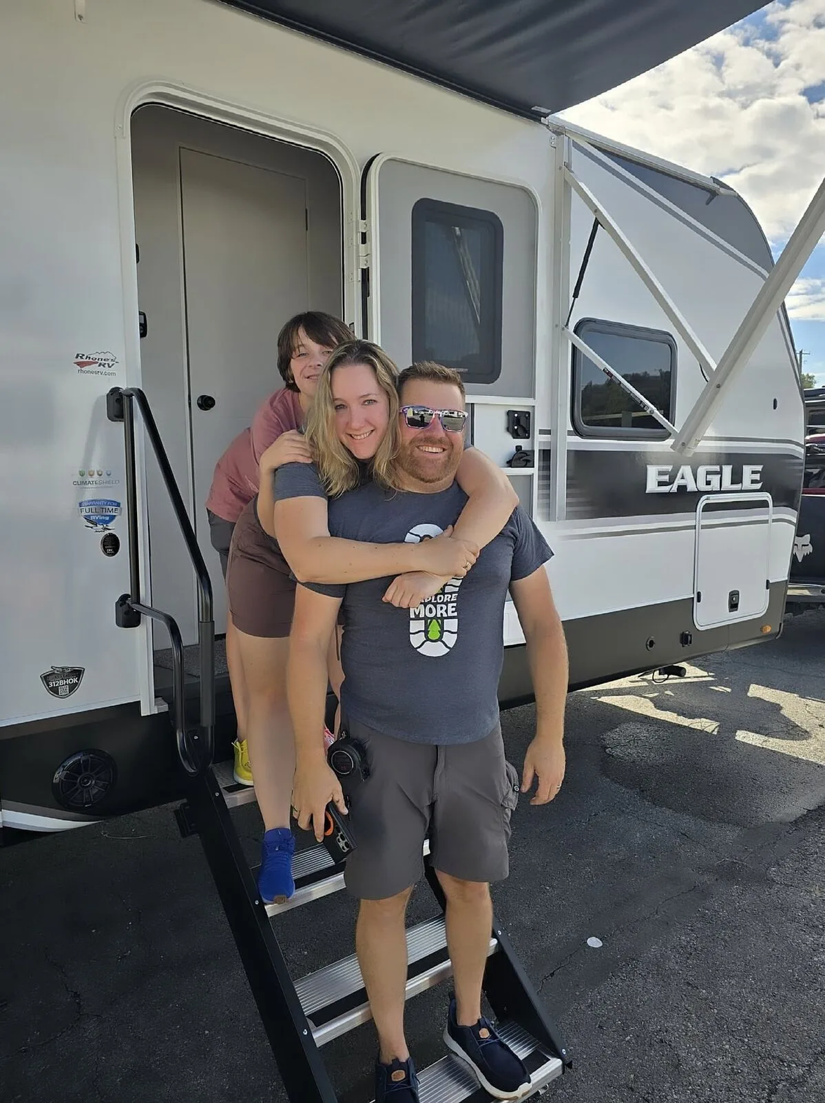 The whole family next to our camper
